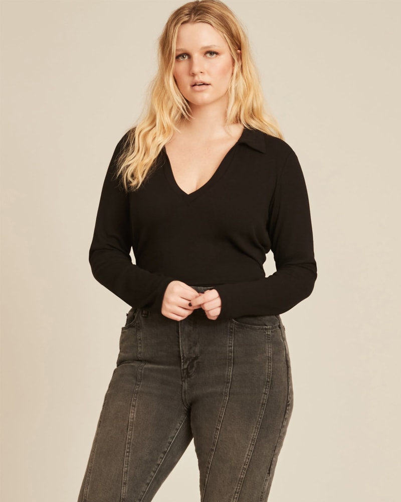 Front of a model wearing a size 1X Niamh Collared Longsleeve in Black by LNA. | dia_product_style_image_id:226396